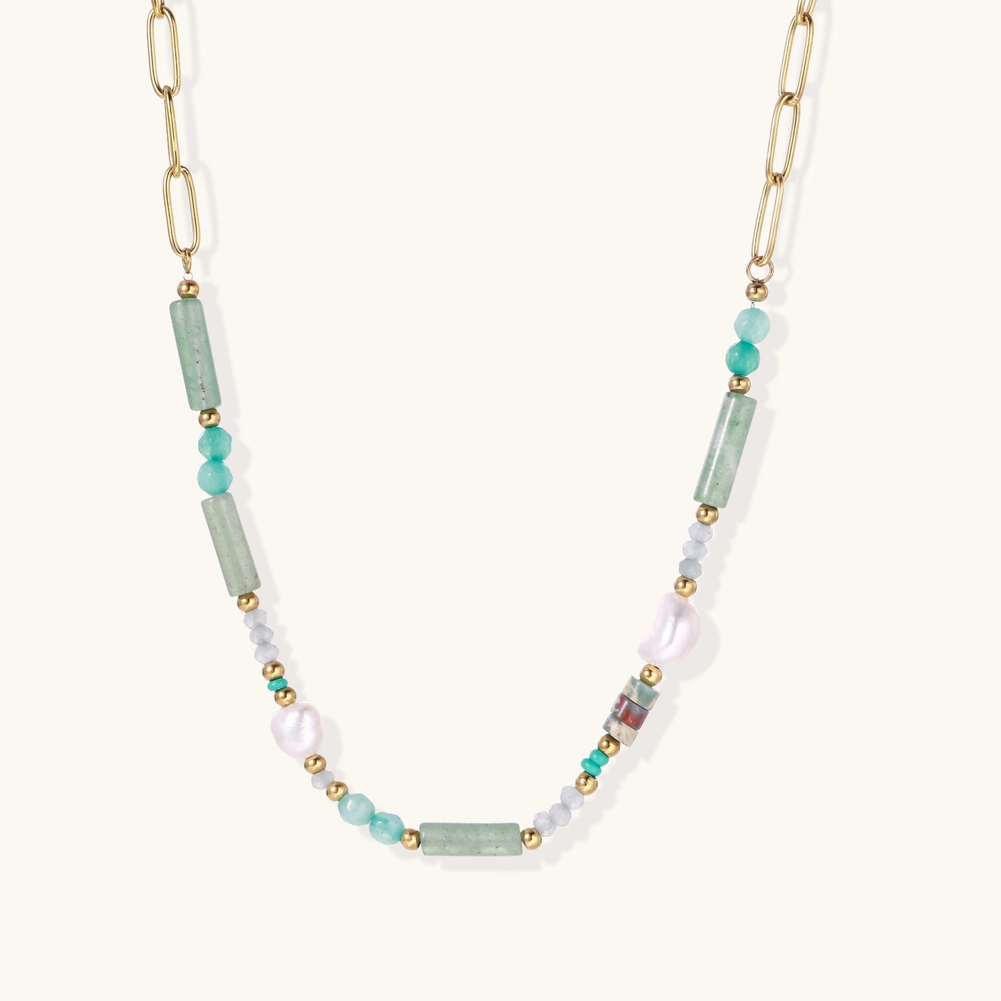 Gold-plated chain necklace with green prasem quartz, freshwater pearls, and mixed beads in modern asymmetrical design