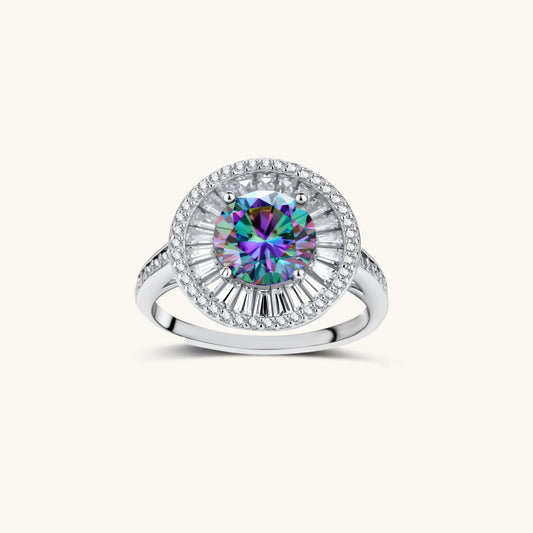 Close-up of sterling silver halo ring with round rainbow moissanite center stone surrounded by baguette-cut stones