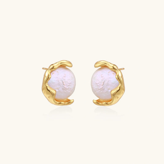 Gold vermeil studs with lustrous pink freshwater pearls in organic crescent settings