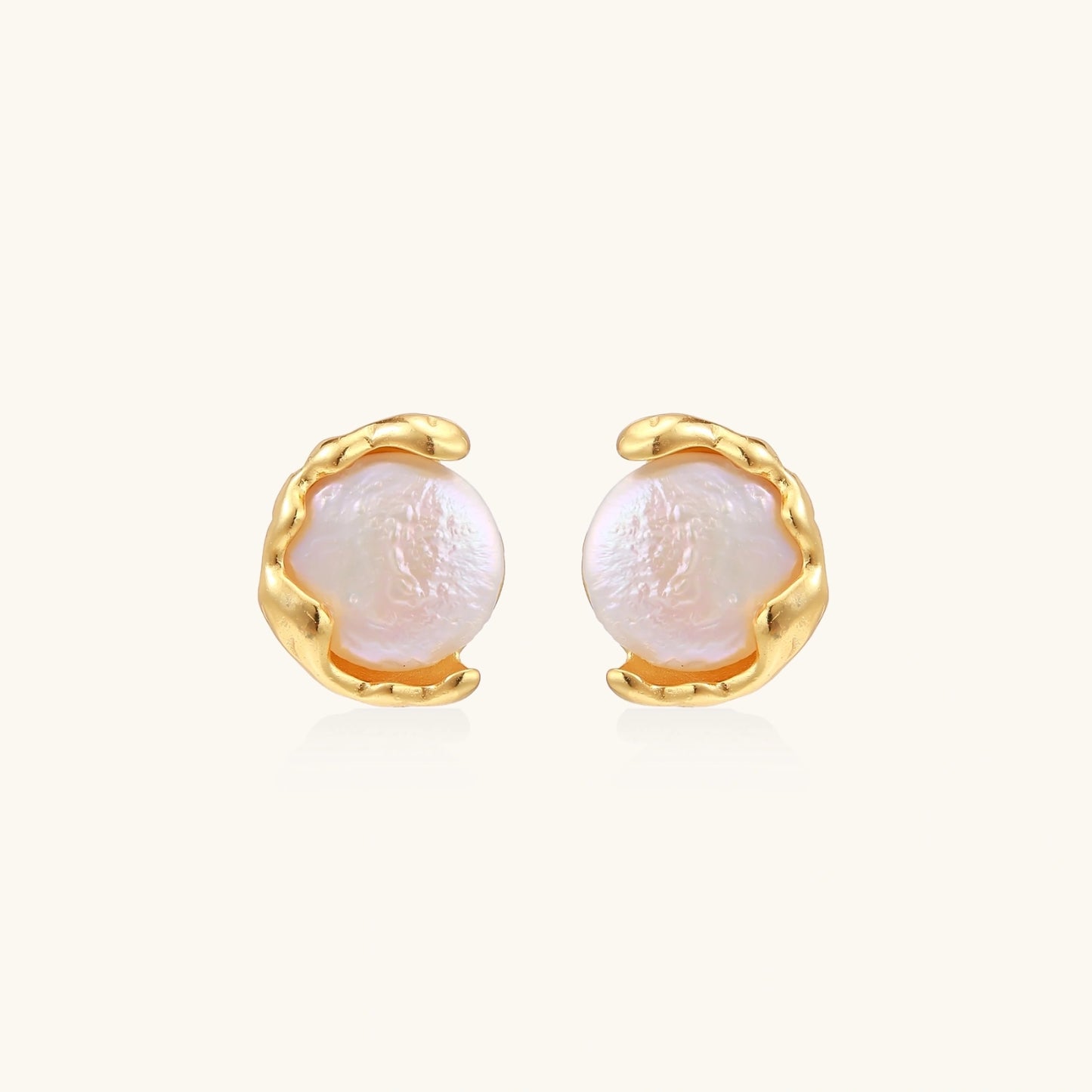 Gold vermeil studs with lustrous pink freshwater pearls in organic crescent settings